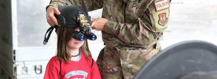 a girl wearing night vision goggles