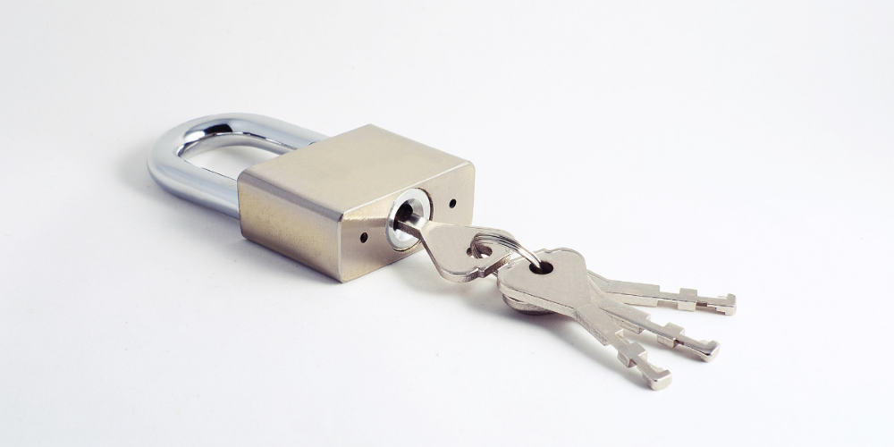 padlock and key attach to keyhole